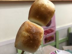 烤奶油小馒头-兄弟联果木炭烤翅·50年家传鸡翅秘方