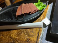 -老牌坊云南鱼豆花火锅(哈西万达店)