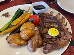 碳烤肉眼牛排及秘制牛排汁-WOLFGANG PUCK KITCHEN & BAR(迪士尼小镇店)