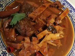 招牌小碗牛肉炖板筋-京门老爆三·铜锅涮肉 爆肚(望京店)