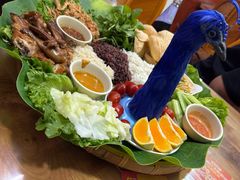 -沐毫傣泐云南菜孔雀宴•手抓饭傣味烧烤(曼听公园店)