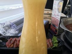鲜榨芒果汁-红菇坊鲜汤火锅(橡树湾店)