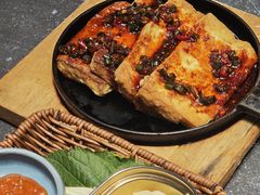 韩式铁板煎豆腐-草家酱蟹炭火烤肉店(珲春南路一店)