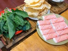 招牌生食蟹肉-东镇老火锅(长春路首店)