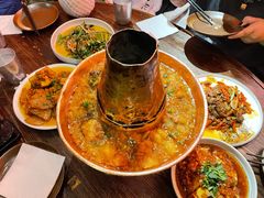 土司铜锅油焖鸡-浩海火烧云傣家菜(京广店)