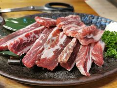 极品浇汁肥牛肋条-草家酱蟹炭火烤肉店(珲春南路一店)
