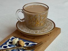 龟兹现煮奶茶配骆驼奶疙瘩-龟兹KUCINA·新疆菜(前滩L+PLAZA店)