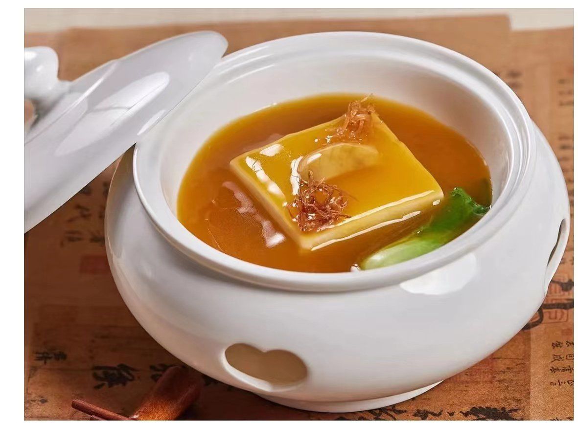 组庵豆腐:鲜嫩可口,是组庵湘菜中的一道经典菜品.