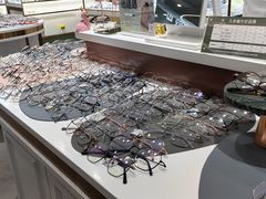 -GOOMI久米眼镜·蔡司·依视路·明月官方授权店(龙德紫金店)