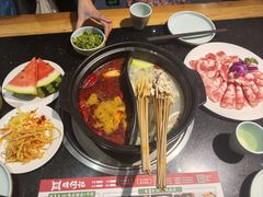 -明何记涮牛肚(品牌首店隋唐植物园南门古城路店)