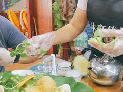 -沐毫傣泐云南菜孔雀宴•手抓饭傣味烧烤(曼听公园店)