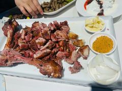 秘制烤羊腿-小河公主秘制烤羊腿(小绿谷店)