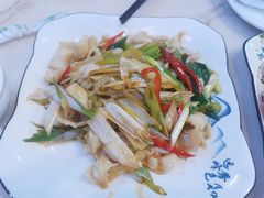 葱爆螺片-富临港·蒸汽海鲜·手抓海鲜·炒菜(栈桥店)