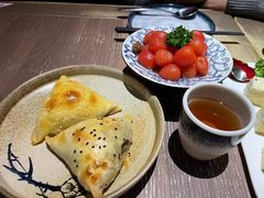 切开的烤包子-那时新疆·车师(大宁音乐广场店)