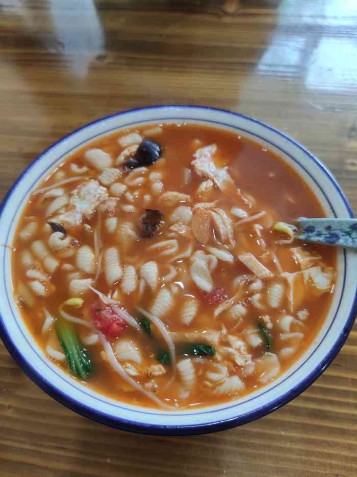 西安特色面馆(潭桥店)-"潭桥商业街上一家生意很好的西安面馆,晚上.