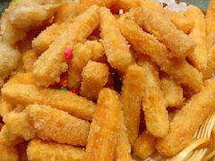 咸蛋黄焗南瓜-春花民族美食(佳木斯总店)