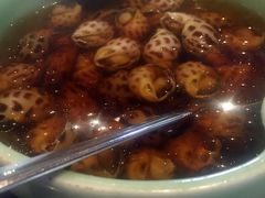 古越陈酿煮花螺-杭州西子湖四季酒店·金沙厅