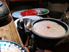 -老牌坊云南鱼豆花火锅(哈西万达店)