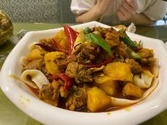 新疆大盘鸡-新疆红柳花餐厅(新洲店)