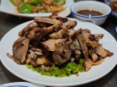 东北熏全肘子-东北农家院·铁锅炖(莘庄店)