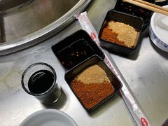 -彝人部落火盆烧烤(原内环足球场店)