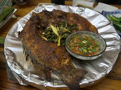 香茅草烤罗非鱼-蜗牛小馆醉乡民谣云南菜(惠新西里店)