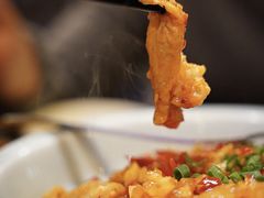 酸萝卜炒肥肠-火宫殿·湘菜小吃·商务宴请·生日聚会(东塘店)