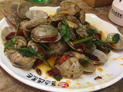 辣炒黄蚬子-金太阳海鲜烧烤·本地人餐厅(东纬路旗舰店)