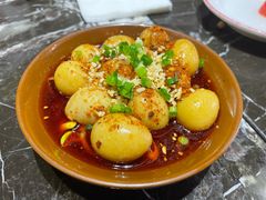 鹌鹑蛋-巴四老城区炭火蛙锅(张江店)