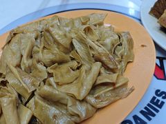 卤豆皮-长城砂煲田鸡粥