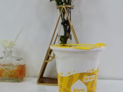 菠萝百香果酸奶-一鸣真鲜奶吧(巴黎都市奶吧店)