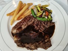 扒澳大利亚肉眼牛排-北京建国饭店杰斯汀法餐厅
