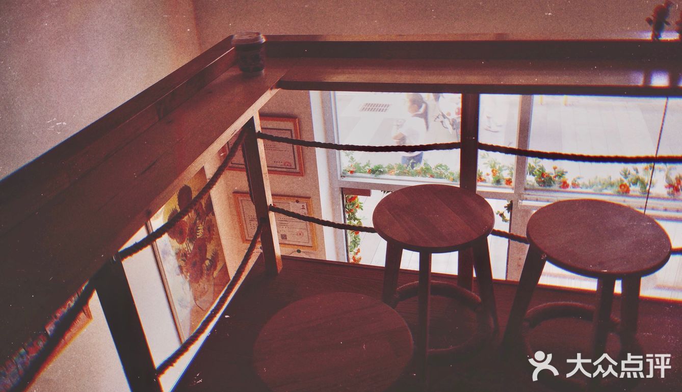 特色「無錫」外帶杯套的精巧咖啡館