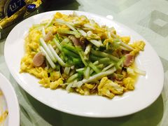 韭黄鸡蛋炒大蛤-添福来墨鱼饺子 · 海鲜东北菜(大连星海·黄浦路店)