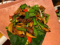 包烧野生牛肝菌-云海肴·汽锅鸡·云南菜(天山百盛优客店)