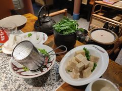 -老牌坊云南鱼豆花火锅(哈西万达店)