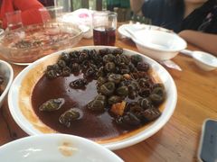 葱爆螺蛳-丫丫蟹庄·苏式园林农家乐·阳澄湖大闸蟹(阳澄湖莲花岛店)