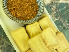 蒜香包浆豆腐-浩海火燒雲傣家菜(芮欧百货店)
