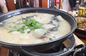 Fresh Fish Head in Clay Pot