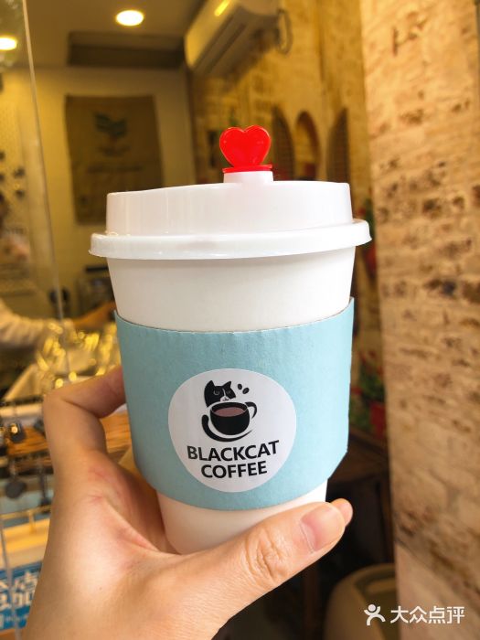 黑猫咖啡图片