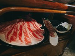 -老牌坊云南鱼豆花火锅(哈西万达店)