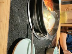 -明何记涮牛肚(品牌首店隋唐植物园南门古城路店)