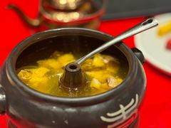 气锅鸡鸡汤-福照楼汽锅鸡·云南菜(火车站锦江店)