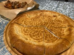 馕坑芝麻馕-巴扎美食·新疆菜·西域歌舞表演餐厅(新疆大厦店)