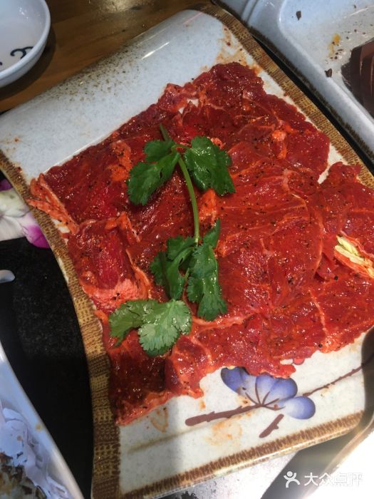 大龙燚火锅(五一广场店)招牌秘制牛肉图片
