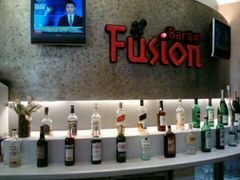 这是酒吧台，上面有很多名贵的酒。-圣廷苑酒店-世纪楼菲苑自助餐厅