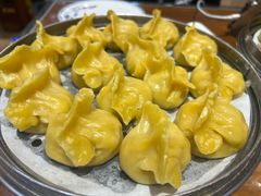 玉米面猪肉酸菜蒸饺-那家老院子东北菜·饺子·小鸡炖蘑菇(艳华街店)