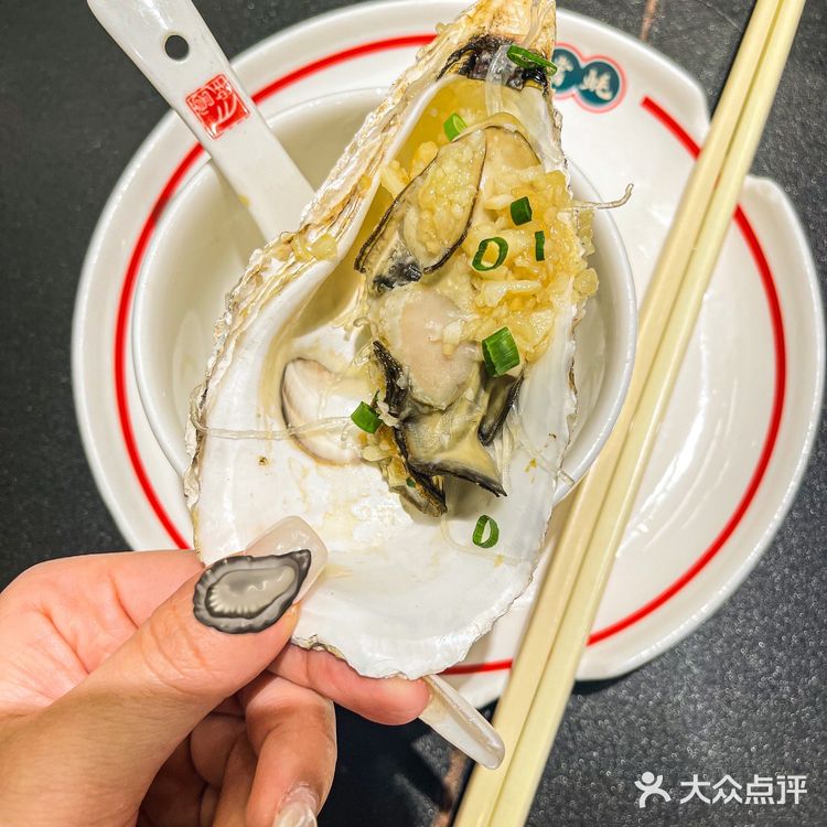 飞尝蚝是谁的美容院?谁的加油站?