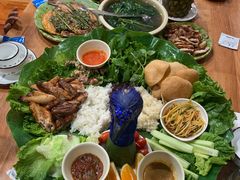 -沐毫傣泐云南菜孔雀宴•手抓饭傣味烧烤(曼听公园店)