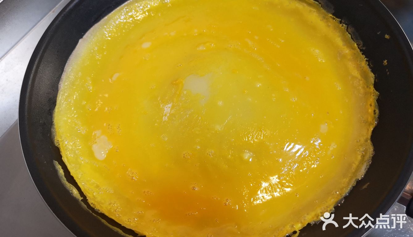 有一块属于金黄的皮下那层油润喷香的糯米